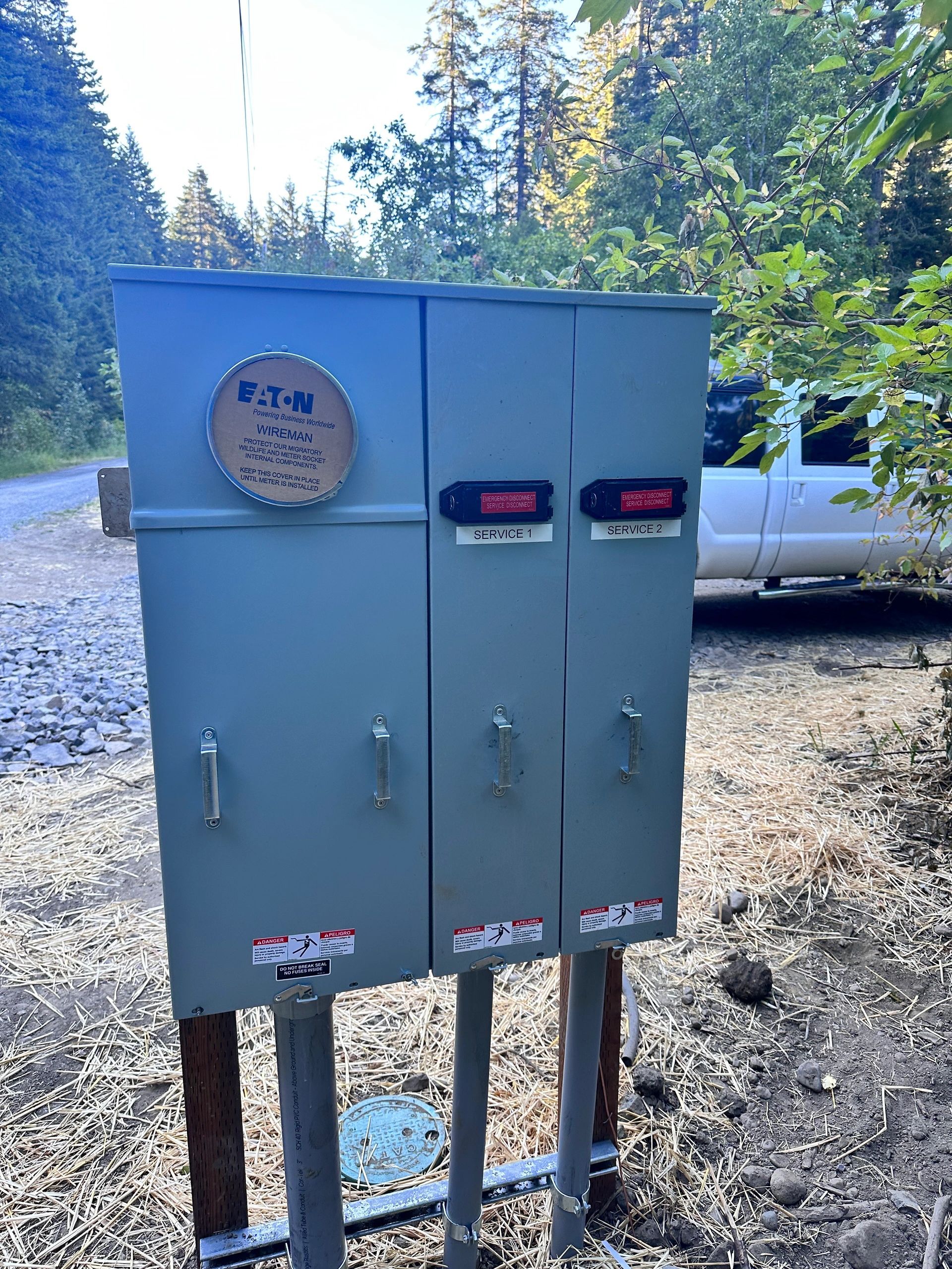 Eaton multi-meter service pedestal installed on a wooded rural property