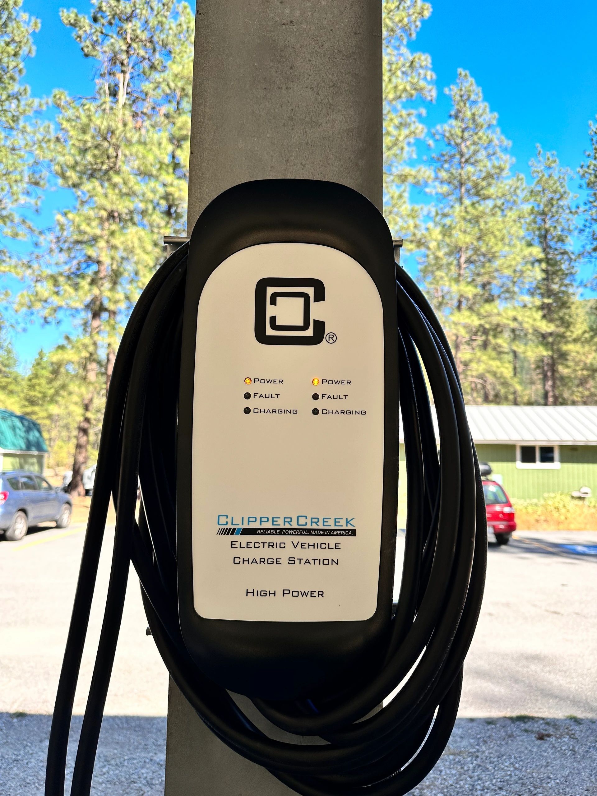 ClipperCreek Level 2 EV charging station mounted on a post outdoors